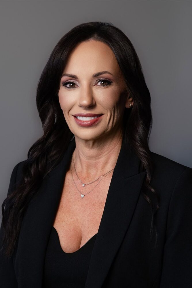 Fotografíagrafía de Sarah Ramsey, abogada en McIntyre Law Firm.