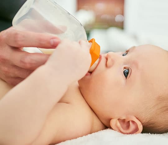 What is Necrotizing Enterocolitis and how does it affect infants?